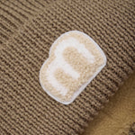 Braune Mütze von MINYMO, die durch ihr schlichtes Design überzeugt und vielseitig kombinierbar ist.