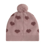 Weiche Teddy-Pile-Haube von Minymo in zartem Rosa mit niedlichem Herzmuster. Angenehm zu tragen und perfekt für kühle Tage. Aus hochwertiger Materialmischung: 52% Viscose, 28% Polyester und 20% Nylon für optimalen Komfort und Langlebigkeit.