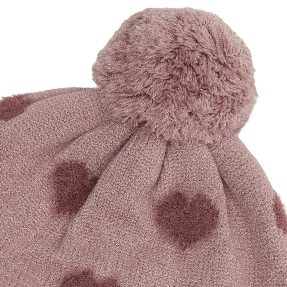 Weiche Teddy-Pile-Haube von Minymo in zartem Rosa mit niedlichem Herzmuster. Angenehm zu tragen und perfekt für kühle Tage. Aus hochwertiger Materialmischung: 52% Viscose, 28% Polyester und 20% Nylon für optimalen Komfort und Langlebigkeit.
