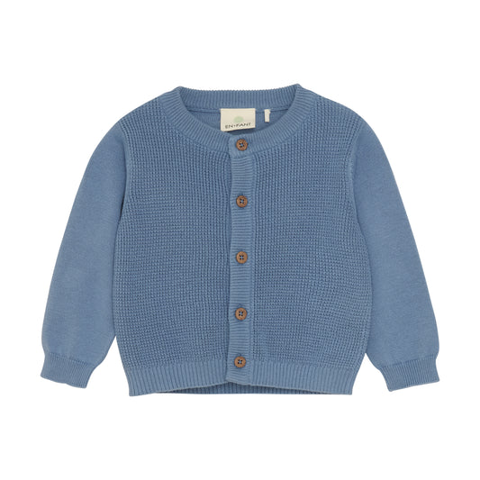 ie blaue Strickweste von Enfant überzeugt mit hochwertiger Verarbeitung und weichem Material. Sie bietet angenehmen Tragekomfort und lässt sich vielseitig zu verschiedenen Outfits kombinieren – perfekt für stilbewusste Kinder.