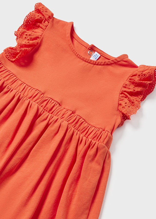 Kleid mit Knopfleiste hinten, und Tasche