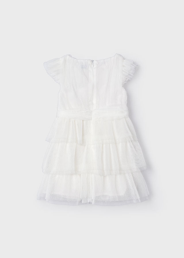 Kurzarm MädchenKleid mit Rüschendetails. Verdeckter Reißverschluss am Rücken. Hergestellt aus leicht-luftigem Tüllstoff. Modell mit plissiertem Design. Zierelemente: Glitter, dekorative Rüschen. Aus Sicherheitsgründen können kleine Größen (2-3 Jahre) einige Variationen in den dekorativen Elementen aufweisen, die im Design verwendet werden.