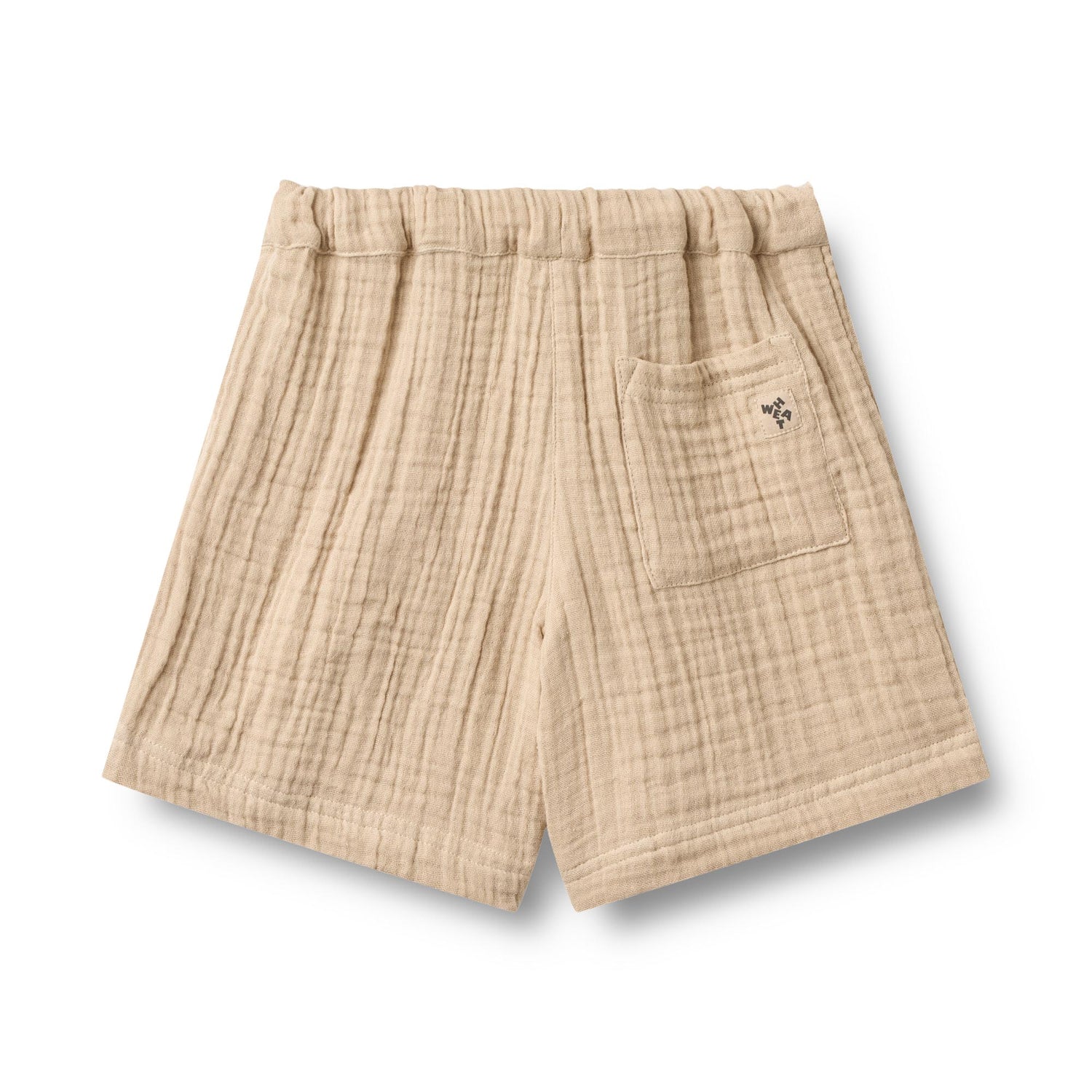 Leichte Shorts aus zartem Musselin in warmem Beige – perfekt für warme Tage. Die Shorts bestehen aus 100% Bio-Baumwolle und bieten maximalen Komfort und Atmungsaktivität. Das natürliche Material ist sanft zur Haut und umweltfreundlich. Ideal für Freizeit und entspannte Sommertage.