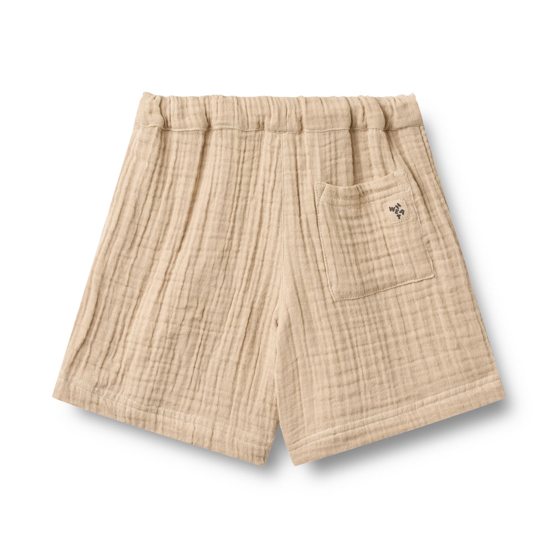 Leichte Shorts aus zartem Musselin in warmem Beige – perfekt für warme Tage. Die Shorts bestehen aus 100% Bio-Baumwolle und bieten maximalen Komfort und Atmungsaktivität. Das natürliche Material ist sanft zur Haut und umweltfreundlich. Ideal für Freizeit und entspannte Sommertage.
