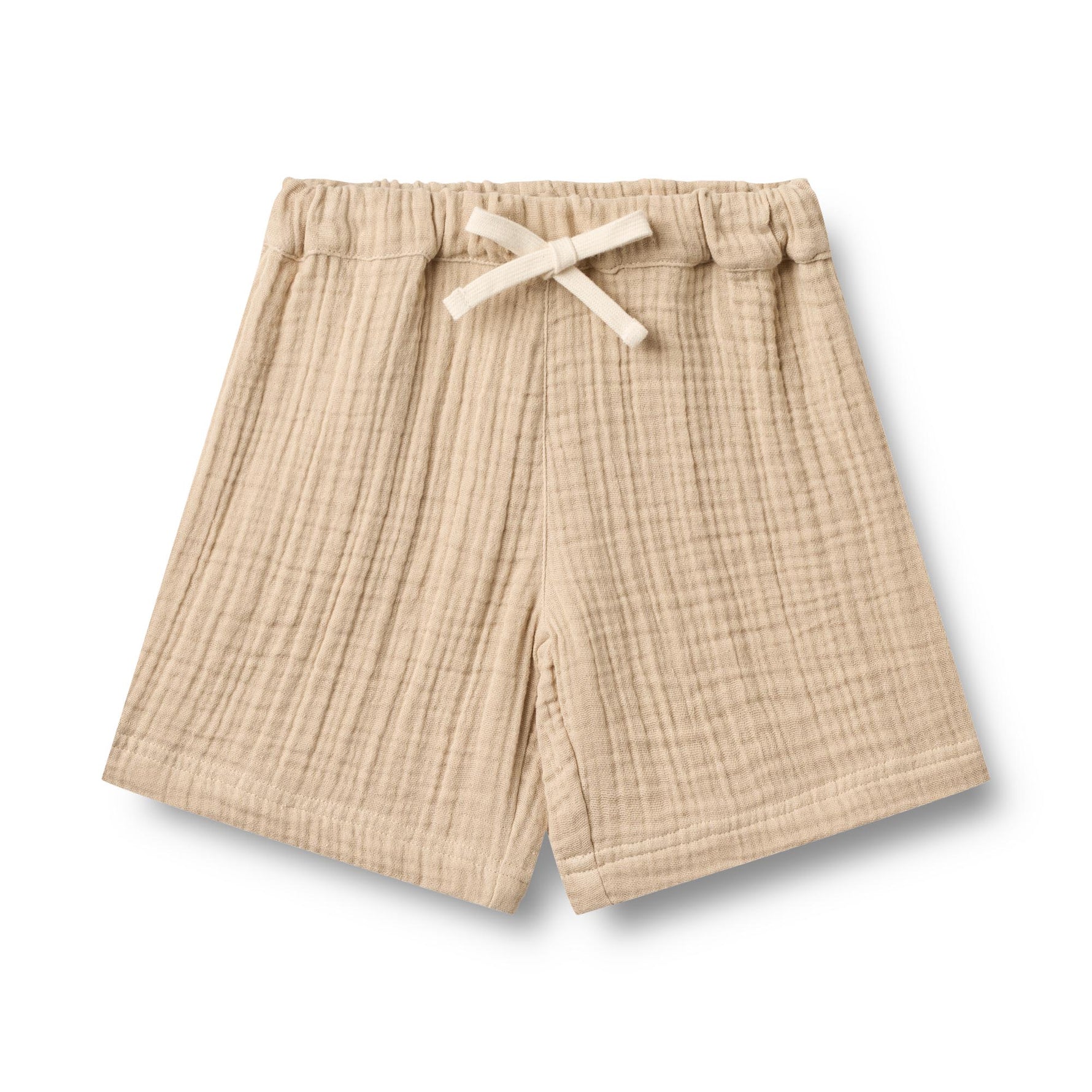 Leichte Shorts aus zartem Musselin in warmem Beige – perfekt für warme Tage. Die Shorts bestehen aus 100% Bio-Baumwolle und bieten maximalen Komfort und Atmungsaktivität. Das natürliche Material ist sanft zur Haut und umweltfreundlich. Ideal für Freizeit und entspannte Sommertage.