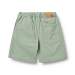 Leichte und bequeme Shorts in frischem Mintgrün von WHEAT aus 100% Bio-Baumwolle. Das atmungsaktive Material sorgt für optimalen Tragekomfort an warmen Tagen. Die klassische Schnittform macht die Bendix zu einem vielseitigen Basics-Piece für Sommer-Outfits. Nachhaltig produziert und angenehm weich auf der Haut.