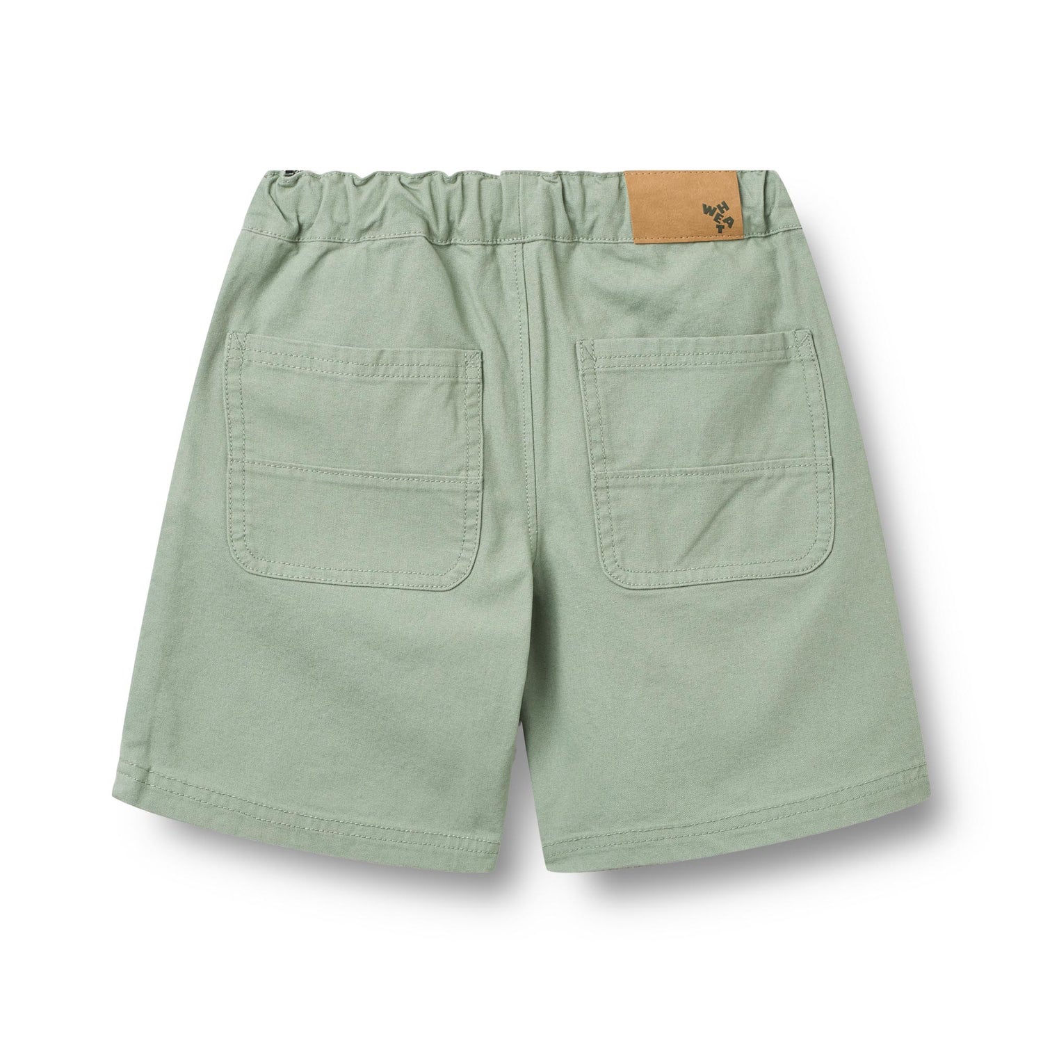 Leichte und bequeme Shorts in frischem Mintgrün von WHEAT aus 100% Bio-Baumwolle. Das atmungsaktive Material sorgt für optimalen Tragekomfort an warmen Tagen. Die klassische Schnittform macht die Bendix zu einem vielseitigen Basics-Piece für Sommer-Outfits. Nachhaltig produziert und angenehm weich auf der Haut.