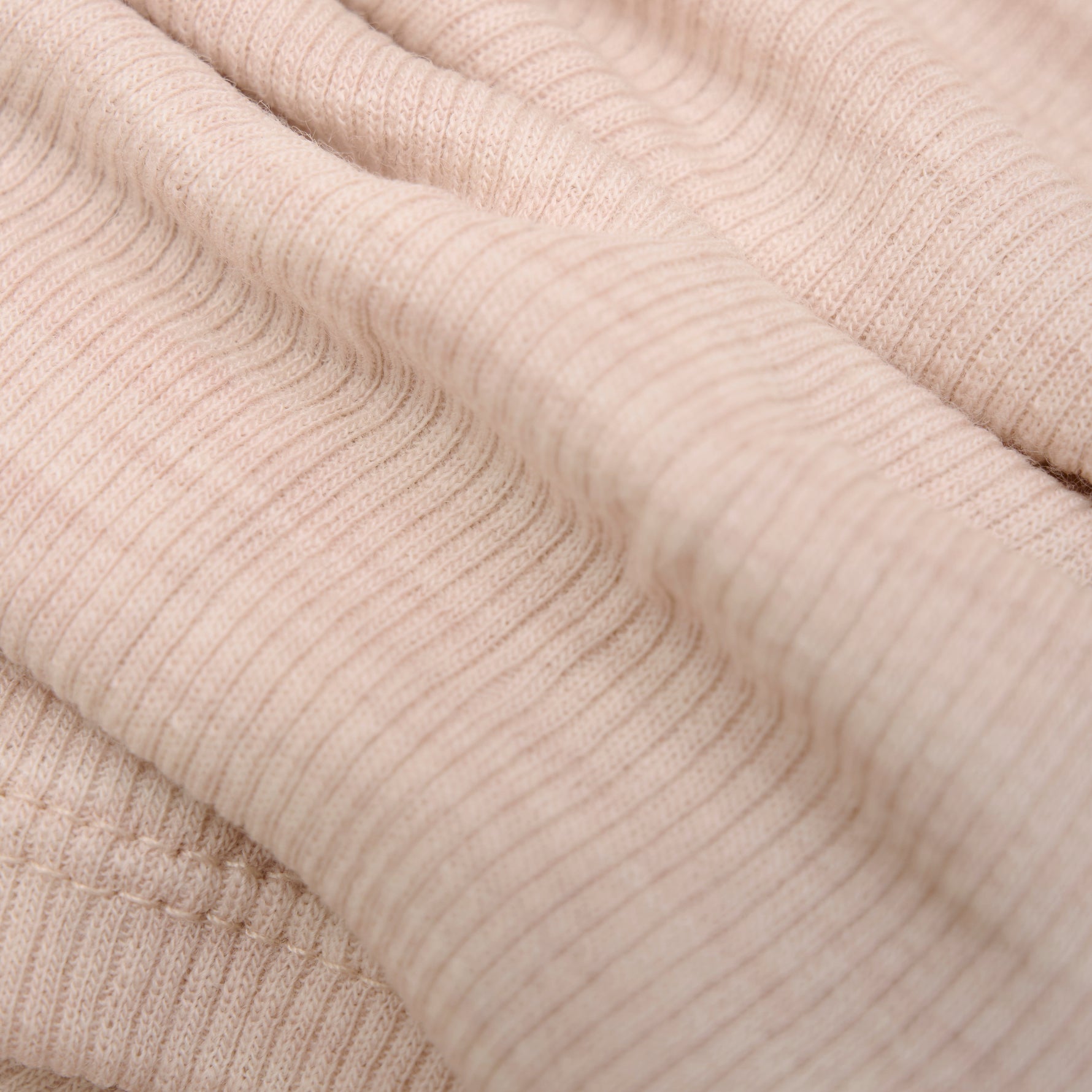 Dieser langärmelige Wollbody in Braun von Celavi bietet angenehme Wärme und Komfort für Ihr Kind.