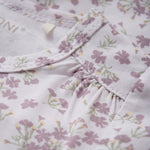 Kurzärmeliger Body von Fixoni mit elegantem Blumenmotiv, der Komfort und stilvolle Ästhetik vereint. Die hochwertige Verarbeitung garantiert optimale Passform für alltäglichen Tragekomfort.