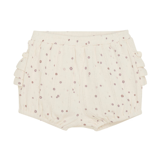 Diese Bloomers von Fixoni überzeugen mit einem zarten, dezenten Blumenmuster und bieten stilvollen Komfort für Ihr Kind.

