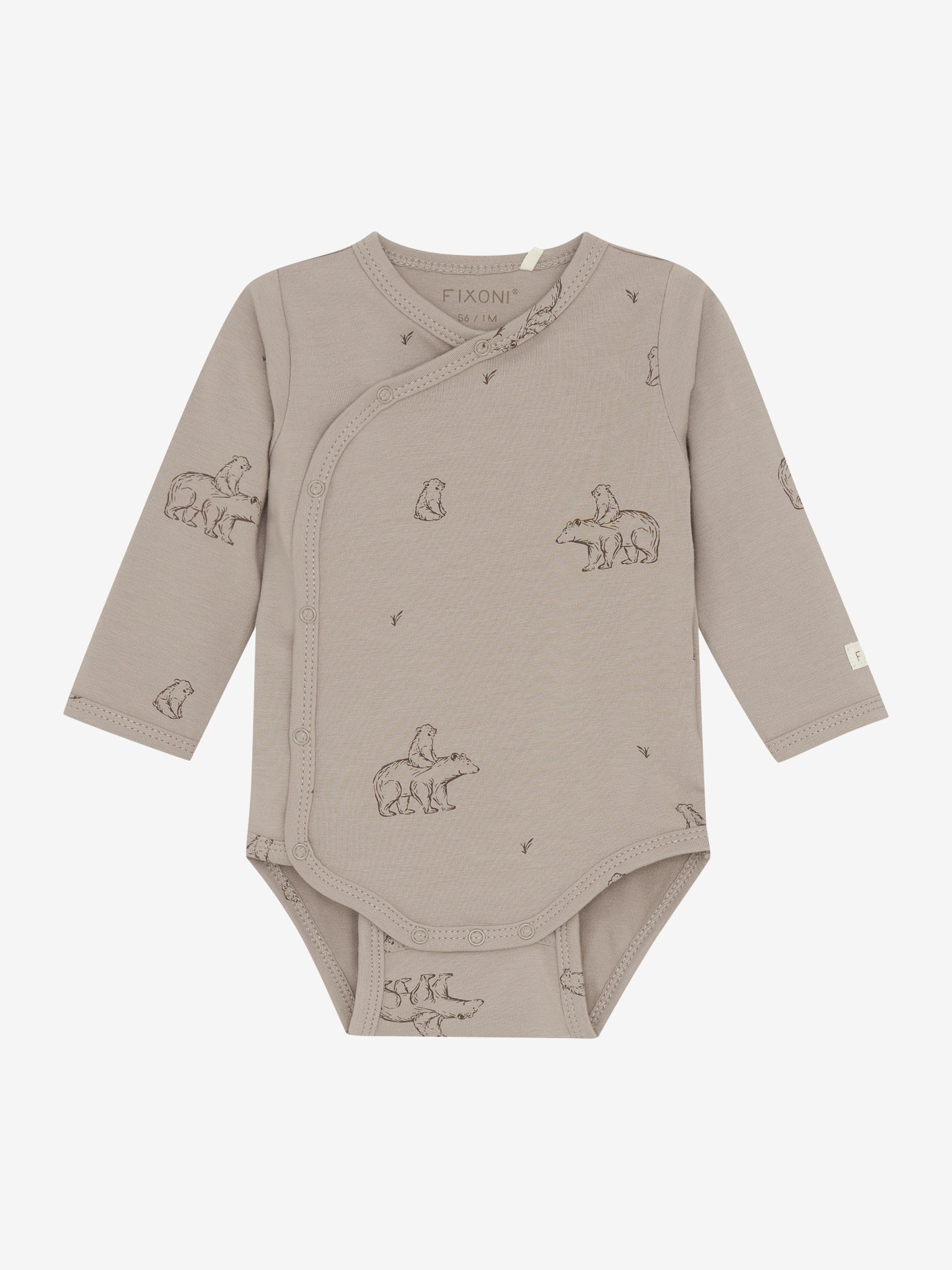Der langärmlige Wickelbody von Fixoni in Beige überzeugt mit einem charmanten Bärenmotiv und bietet angenehmen Tragekomfort für Ihr Baby.