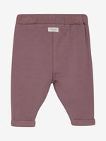 Fixoni präsentiert bequeme Sweatpants in zartem Rosa für stilvollen Komfort.