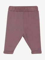 Fixoni präsentiert bequeme Sweatpants in zartem Rosa für stilvollen Komfort.