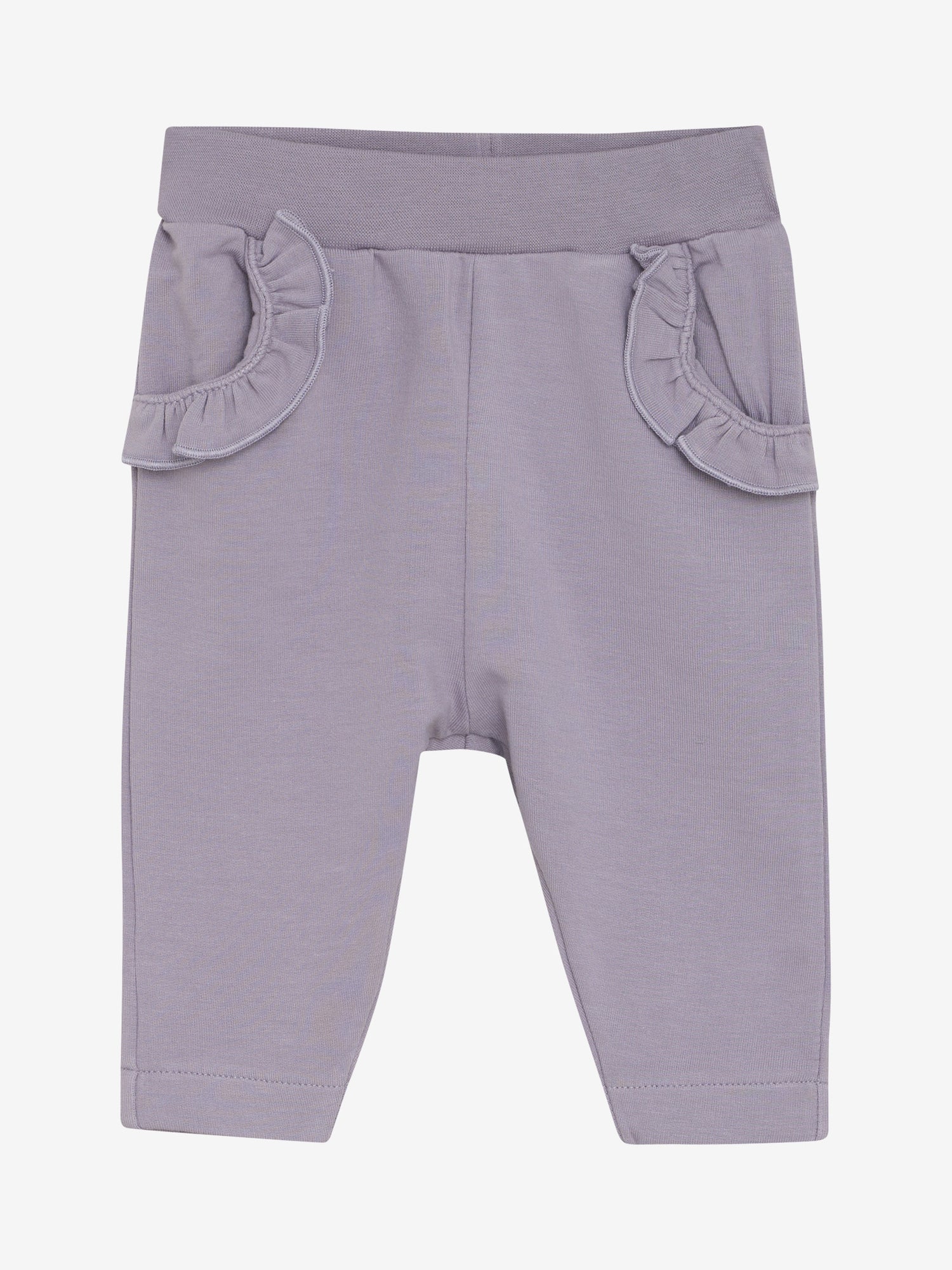 Die lila Sweatpants von Fixoni zeichnen sich durch eine bequeme Passform und hohen Tragekomfort aus, ergänzt durch dekorative Rüschen an den Taschen, die dem Alltag einen stilvollen Akzent verleihen.