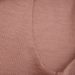 Diese gerippte Wollhaube von Huttelihut bietet dank ihres zweilagigen Designs optimalen Schutz und Wärme für kalte Tage.