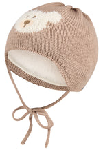 Diese braune Strickmütze von Sterntaler besticht durch ein weißes Bärenmotiv und sorgt für warmen Komfort mit einem charmanten Look.