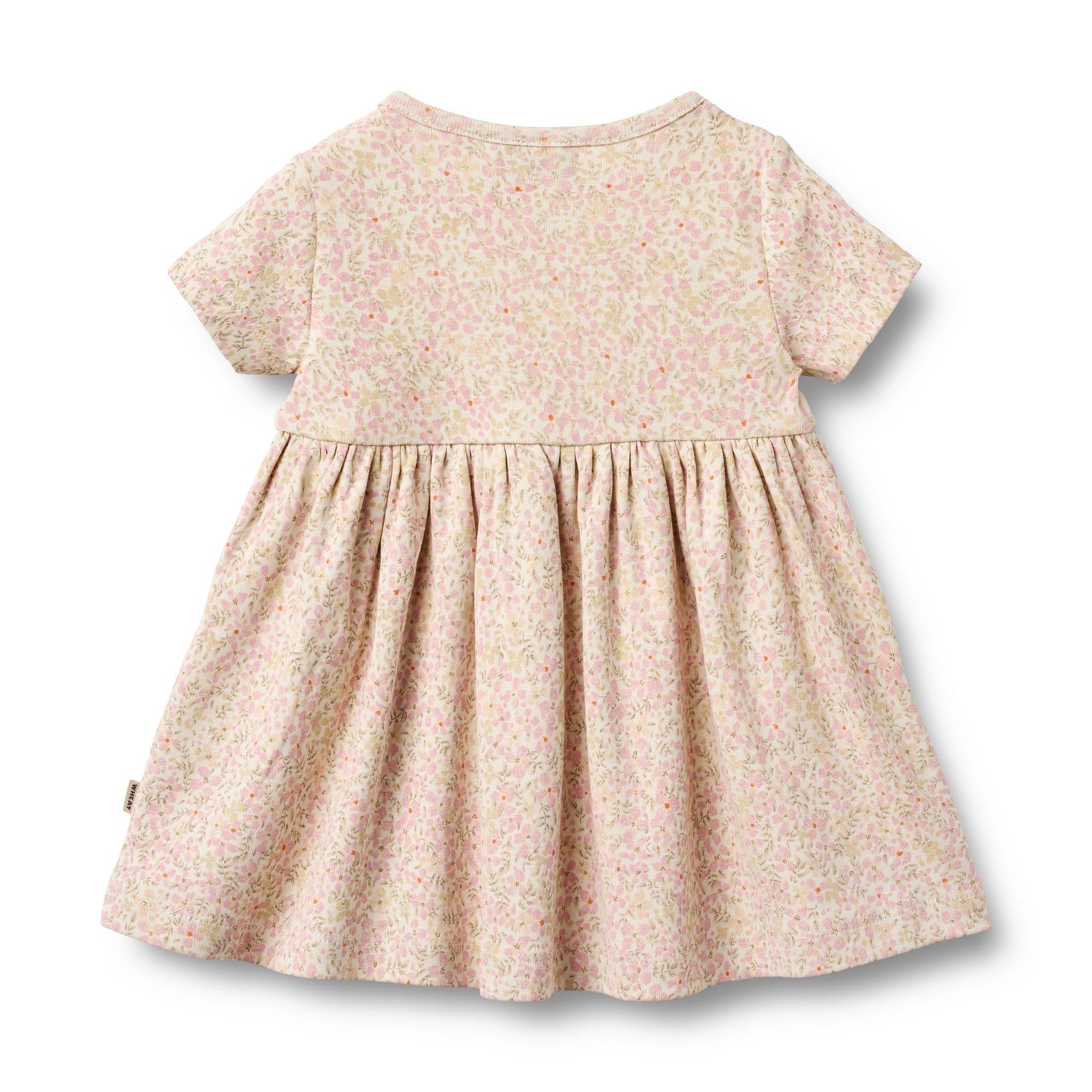 Weiches Jersey-Kleid mit charmanten Blumenmotiven von WHEAT. Das luftige Kurzarm-Design macht es zum perfekten Begleiter für warme Tage. Aus 100% Bio-Baumwolle gefertigt, bietet es höchsten Tragekomfort und Hautfreundlichkeit. Das zeitlose All-Over-Print-Muster verleiht dem Kleid eine verspielte Note, während die schlichte Silhouette vielseitig kombinierbar bleibt. Ideal für Alltag und Freizeit.
