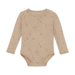 Entdecken Sie den Komfort und die Weichheit von unserem langarm Body von Fixoni in beige mit einem süßen Pusteblumenprint aus hochwertiger Wolle und Seide. Perfekt für empfindliche Haut und optimal für kalte Tage