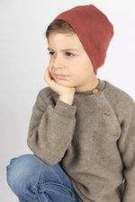 Bestens ausgestattet in der Übergangszeit im Herbst oder Frühjahr sind die Kleinsten mit dieser Mütze von Engel aus Wolle-Seide. Das leichte Material sorgt für hohen Tragekomfort und schützt das zarte Köpfchen vor Wind und Wetter. Besonderes Plus: Auch unter dem (Fahrrad-)Helm lässt sich diese Mütze ganz prima tragen.