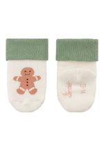 Dieses 3er-Set Baby-Socken von Sterntaler begeistert mit festlichen Weihnachtsmotiven und sorgt für warme, gemütliche Füße in der kalten Jahreszeit.