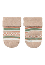 Dieses 3er-Set Baby-Socken von Sterntaler begeistert mit festlichen Weihnachtsmotiven und sorgt für warme, gemütliche Füße in der kalten Jahreszeit.