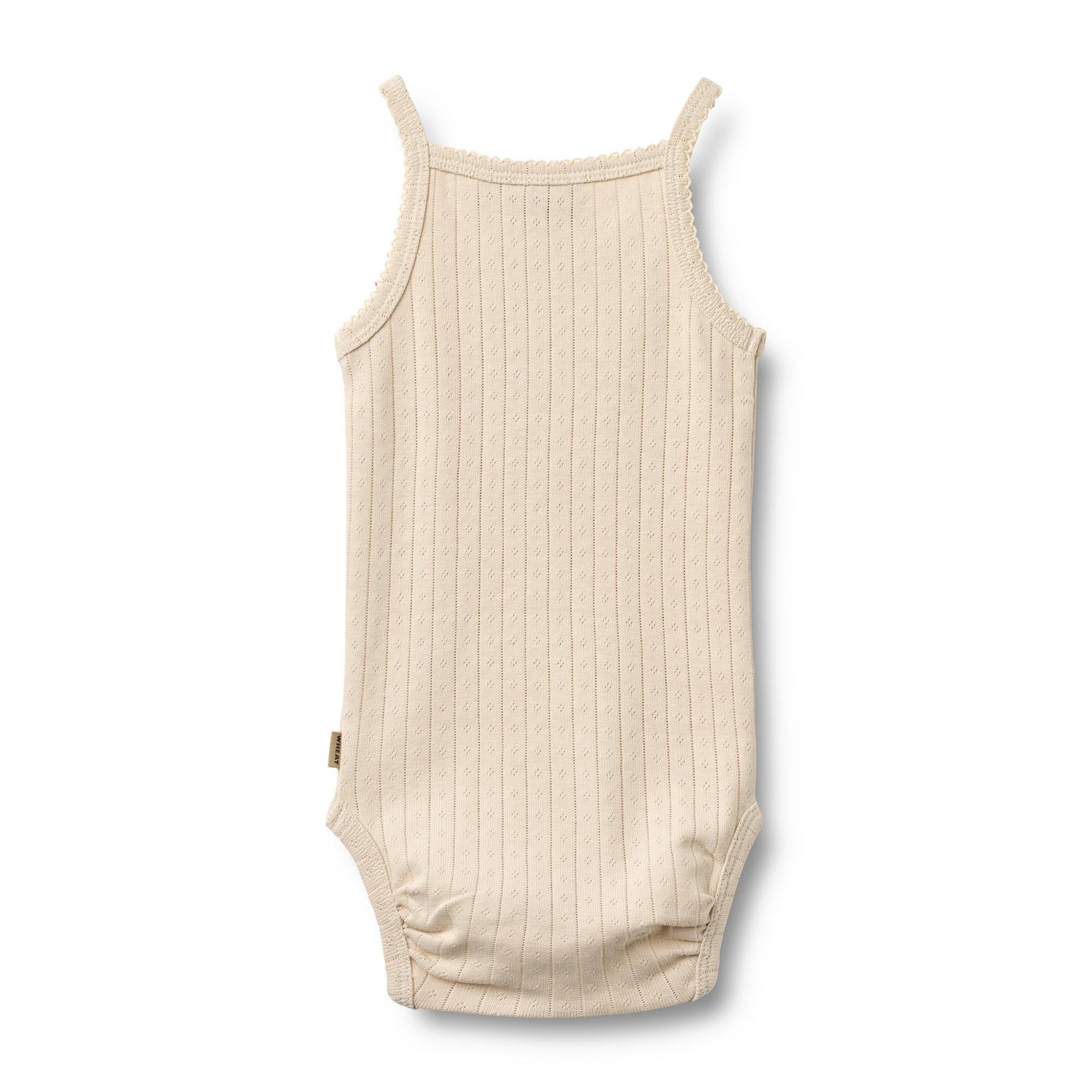 Weicher und atmungsaktivesr Body von WHEAT aus 100% Bio-Baumwolle. Das ärmellose Design bietet maximale Bewegungsfreiheit und Komfort für den ganzen Tag. Perfekt als Basis-Layer unter Kleidung oder zum Selbertragen. Die hochwertige Bio-Baumwolle ist sanft zur Haut und ideal für empfindliche Babyhaut. Langlebig, pflegeleicht und nachhaltig produziert.