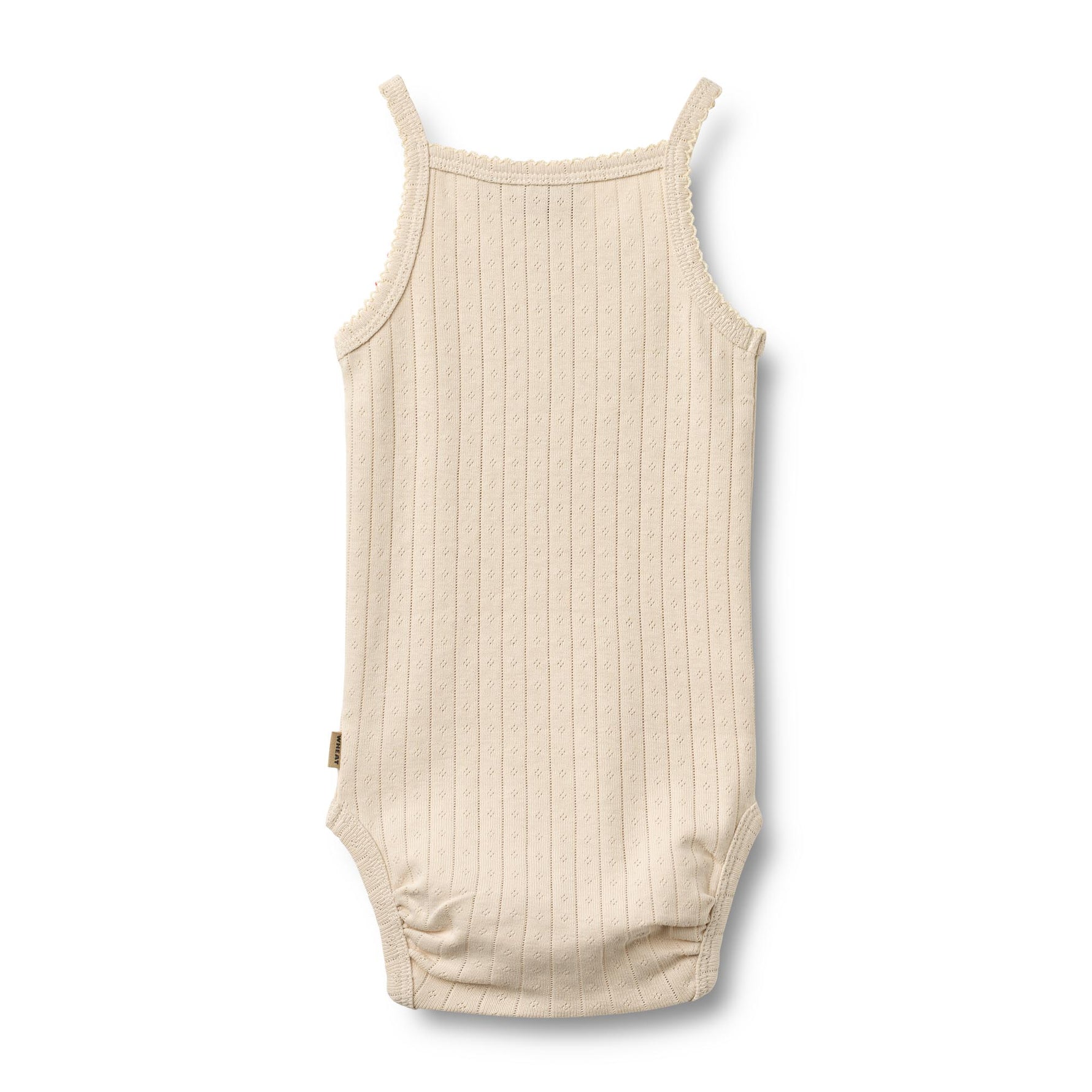Weicher und atmungsaktivesr Body von WHEAT aus 100% Bio-Baumwolle. Das ärmellose Design bietet maximale Bewegungsfreiheit und Komfort für den ganzen Tag. Perfekt als Basis-Layer unter Kleidung oder zum Selbertragen. Die hochwertige Bio-Baumwolle ist sanft zur Haut und ideal für empfindliche Babyhaut. Langlebig, pflegeleicht und nachhaltig produziert.