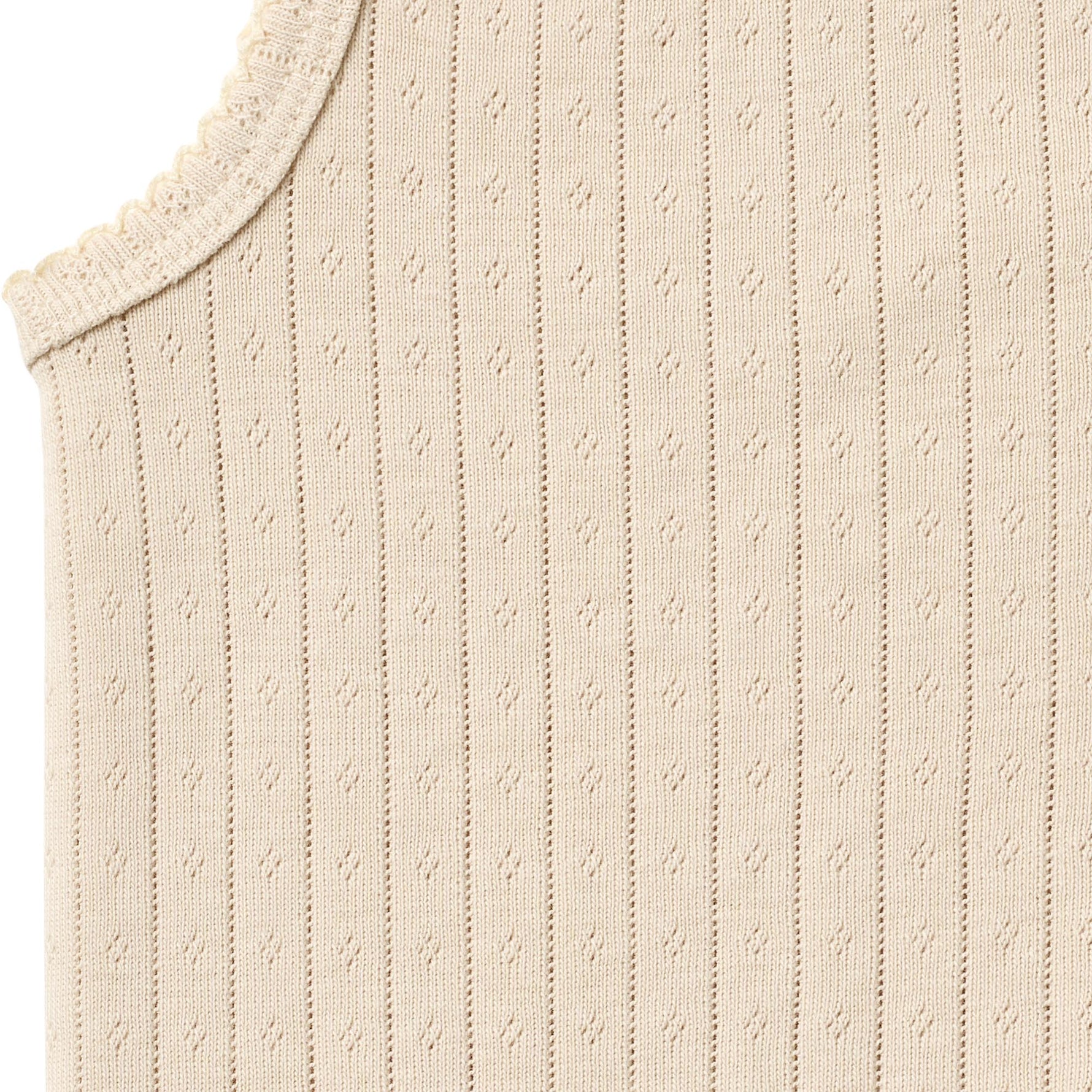 Weicher und atmungsaktivesr Body von WHEAT aus 100% Bio-Baumwolle. Das ärmellose Design bietet maximale Bewegungsfreiheit und Komfort für den ganzen Tag. Perfekt als Basis-Layer unter Kleidung oder zum Selbertragen. Die hochwertige Bio-Baumwolle ist sanft zur Haut und ideal für empfindliche Babyhaut. Langlebig, pflegeleicht und nachhaltig produziert.
