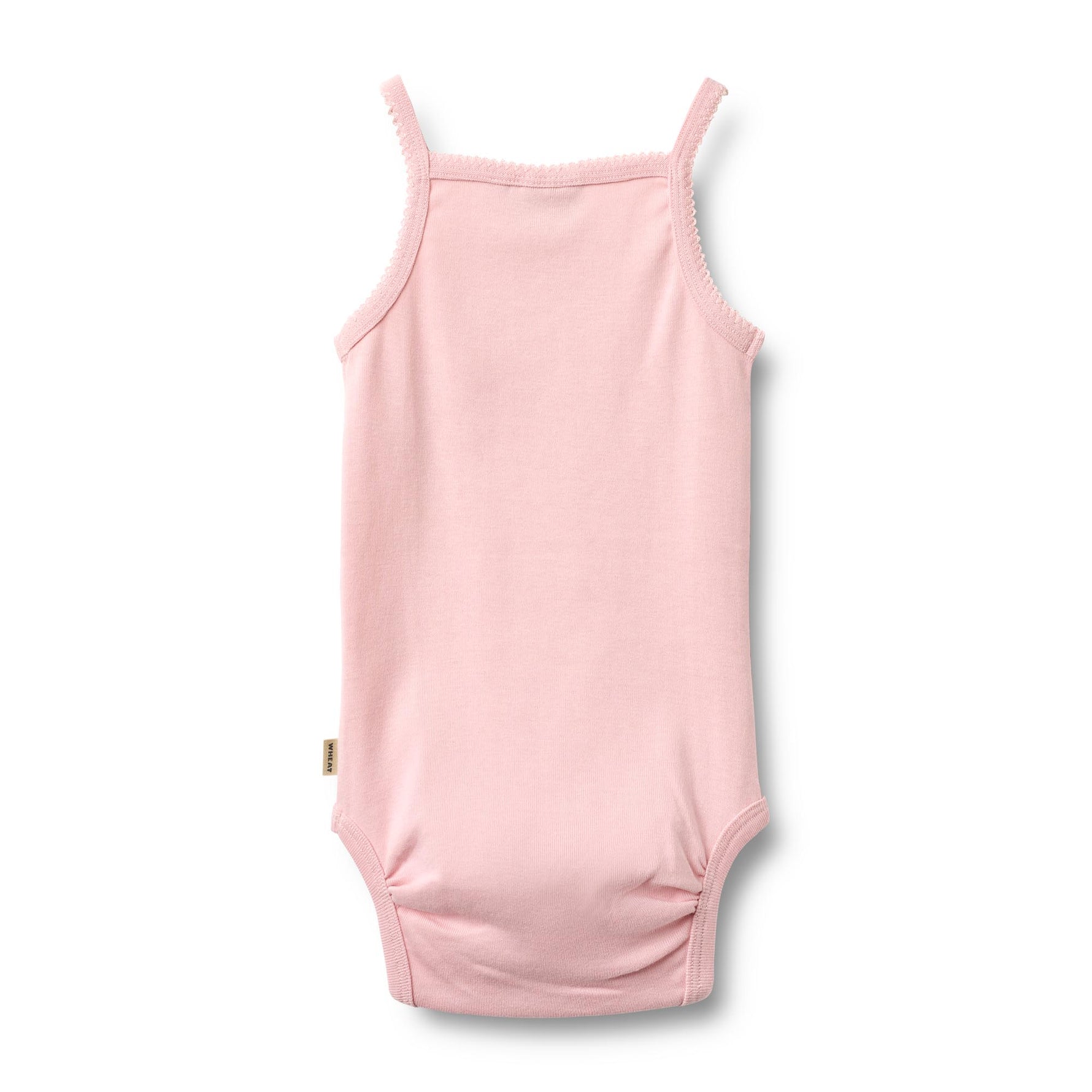 Weicher und atmungsaktivesr Body von WHEAT aus 100% Bio-Baumwolle. Das ärmellose Design bietet maximale Bewegungsfreiheit und Komfort für den ganzen Tag. Perfekt als Basis-Layer unter Kleidung oder zum Selbertragen. Die hochwertige Bio-Baumwolle ist sanft zur Haut und ideal für empfindliche Babyhaut. Langlebig, pflegeleicht und nachhaltig produziert.