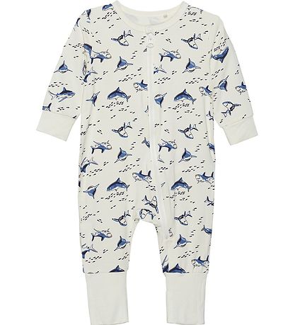 Dieses Nightsuit von MINYMO begeistert mit einem auffälligen Hai-Design und sorgt für angenehme Nächte.