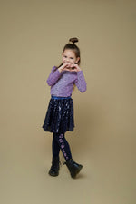 Dieser dunkelviolette Paillettenrock aus der Wild Soul Kollektion von Jubel verleiht jedem Outfit einen funkelnden, einzigartigen Akzent.