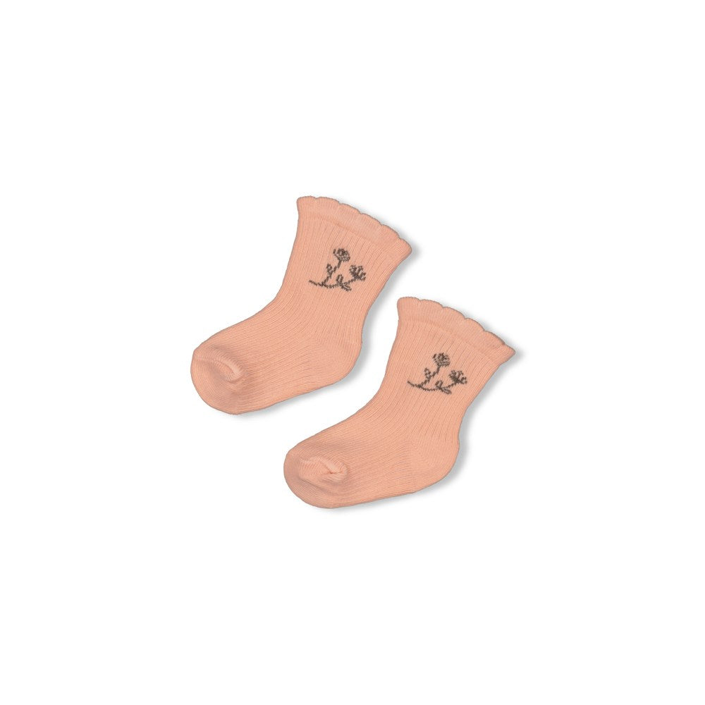 Socken in dezentem rosa mit kleinem Blumenaufdruck