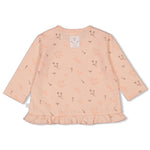 Langarmshirt in dezentem rosa mit Blumenaufdruck und Rüschen