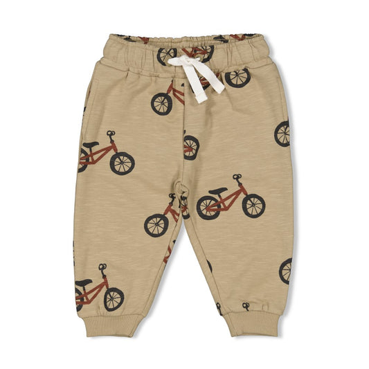 beige Hose mit Fahrradmotiv