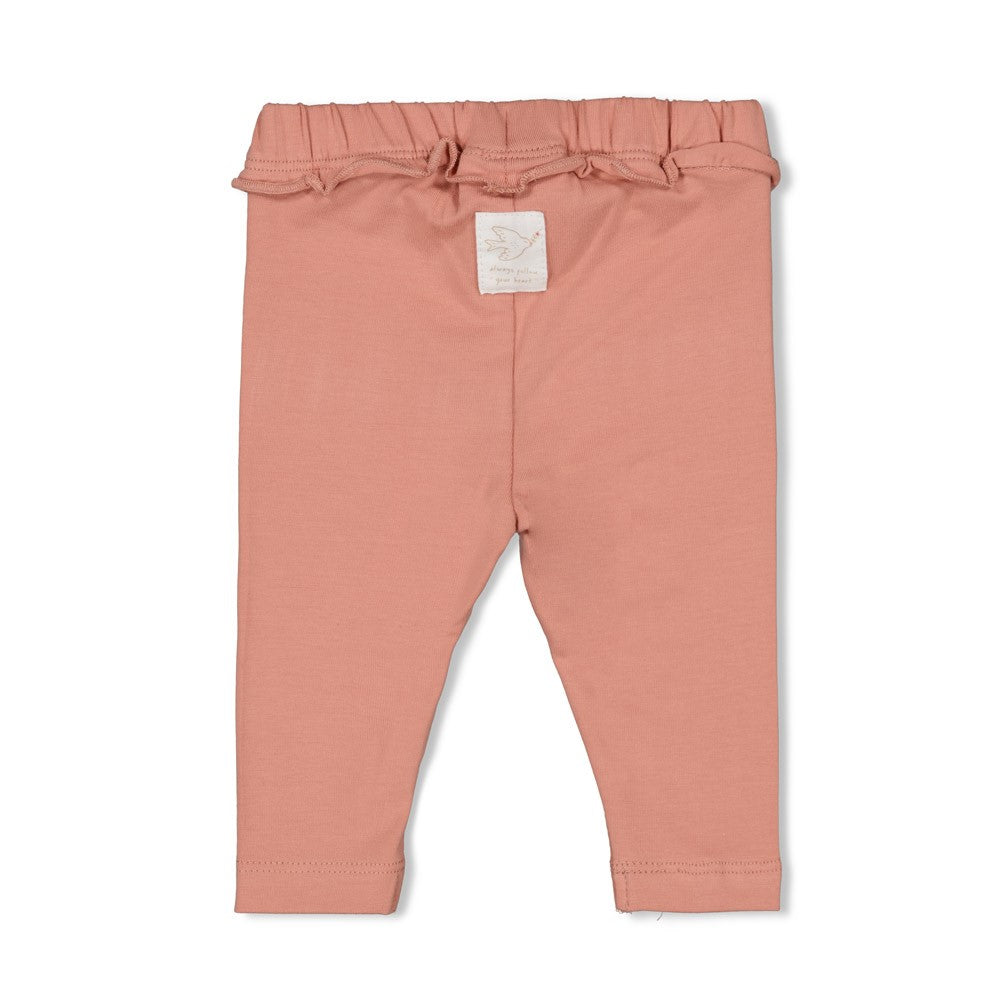 Diese rosa Leggings mit charmantem Schleifendetail stammen aus der Morning Sun Kollektion von Feetje und verleihen jedem Outfit eine verspielte Note.