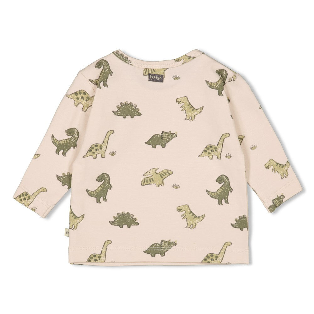 Dieses Langarmshirt aus der Rawrsome Kollektion von Feetje besticht durch einen durchgehenden Dinosaurier-Alloverdruck und bietet Komfort sowie Stil für kleine Dino-Fans.