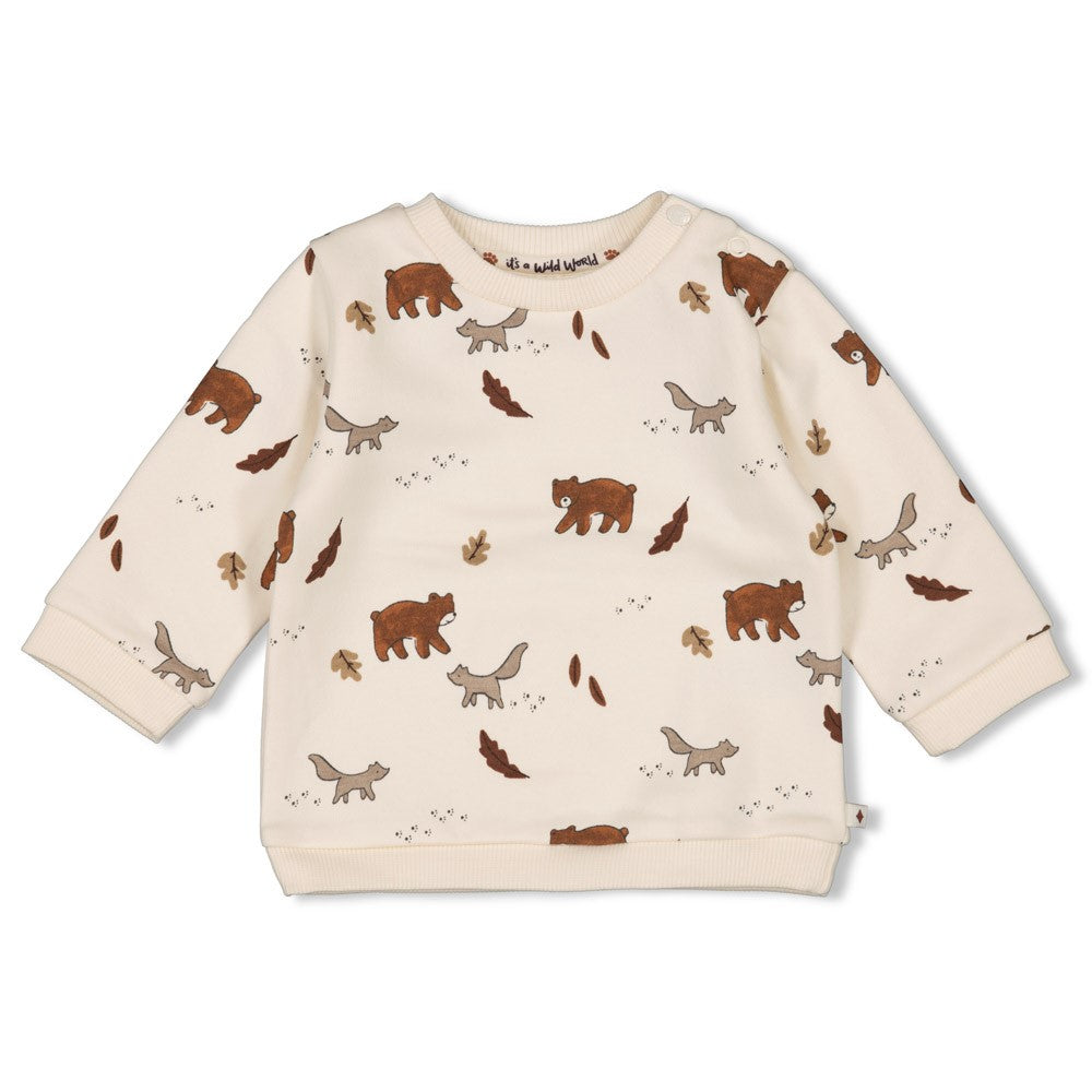 Dieser beige Pullover aus der Wild World Kollektion von Feetje besticht durch ein durchgängiges Bärenmuster und verbindet stilvolle Eleganz mit einem Hauch von Naturverbundenheit.
