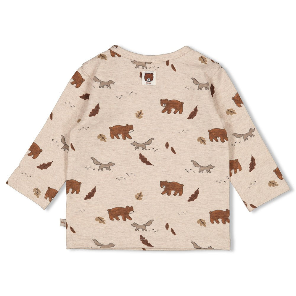 Dieses beige Langarmshirt aus der Wild World Kollektion von Feetje besticht durch einen durchgehenden Bären-Print und vereint stilvolle Eleganz mit verspieltem Design.
