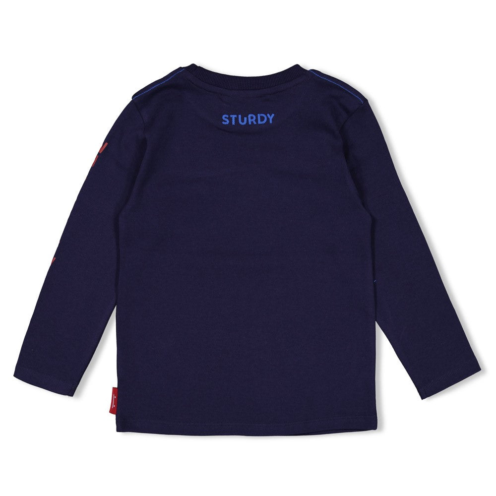 Dieses blaue Langarmshirt mit Walmotiv stammt aus der Waves and Whales Kollektion von Sturdy und verbindet stilvolles Design mit maritimem Flair.